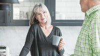 A woman wearing a hearing aid.