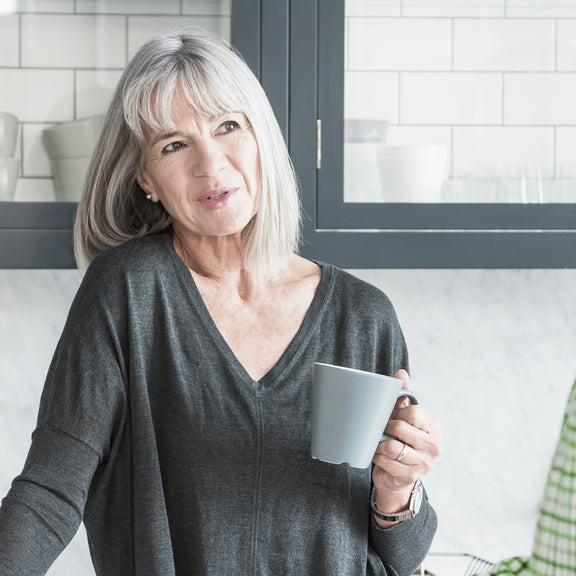 A woman wearing a hearing aid.