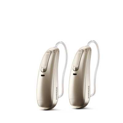 Two Phonak Lumity hearing aids in champagne.