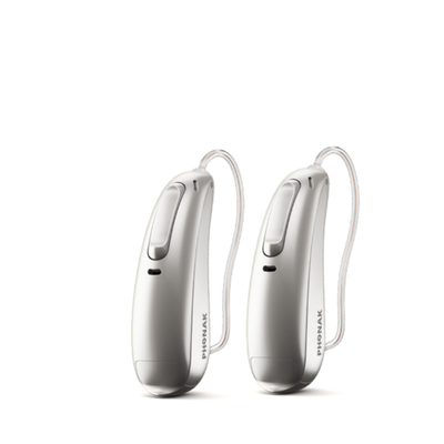 Two Phonak Lumity hearing aids in silver gray..