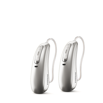 Two Phonak Lumity hearing aids in silver gray.