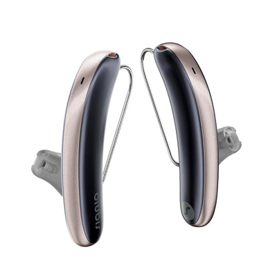 A pair of Signia Styletto IX 7 kit hearing aids in cosmic blue and rose gold.