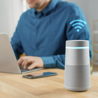 person using bluetooth hearing aids to listen to music