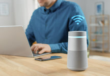 person using bluetooth hearing aids to listen to music