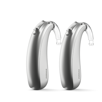 A pair of Phonak Lumity Naida L70 hearing aids silver gray.