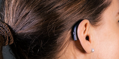 woman wearing resound hearing aid