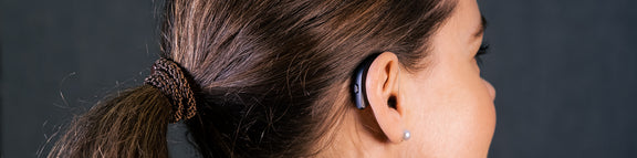 woman wearing resound hearing aid