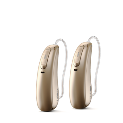Two Phonak Lumity L50 hearing aids in sandbeige.